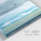 Close-up view of wrapped canvas corner featuring abstract coastal shoreline textures.