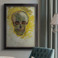 Expressive skull study painting by Vincent van Gogh in an {frame_style_descriptor} displayed in a neutral interior setting.