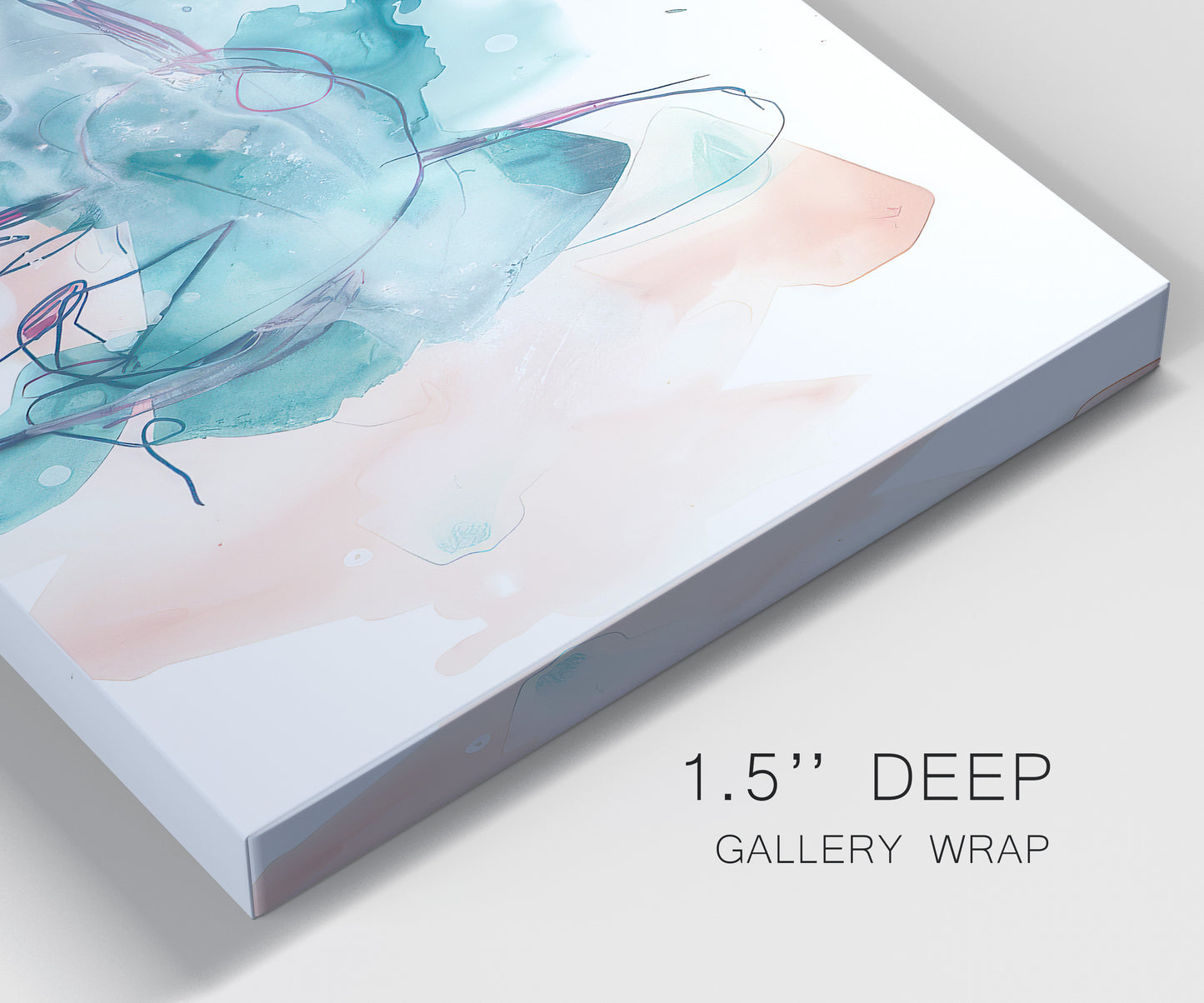 Close-up view of wrapped canvas corner featuring soft abstract watercolor forms.