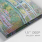 Close-up view of wrapped canvas corner featuring water lilies with arched bridge.