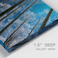 Close-up view of wrapped canvas corner featuring night landscape silhouette photography.