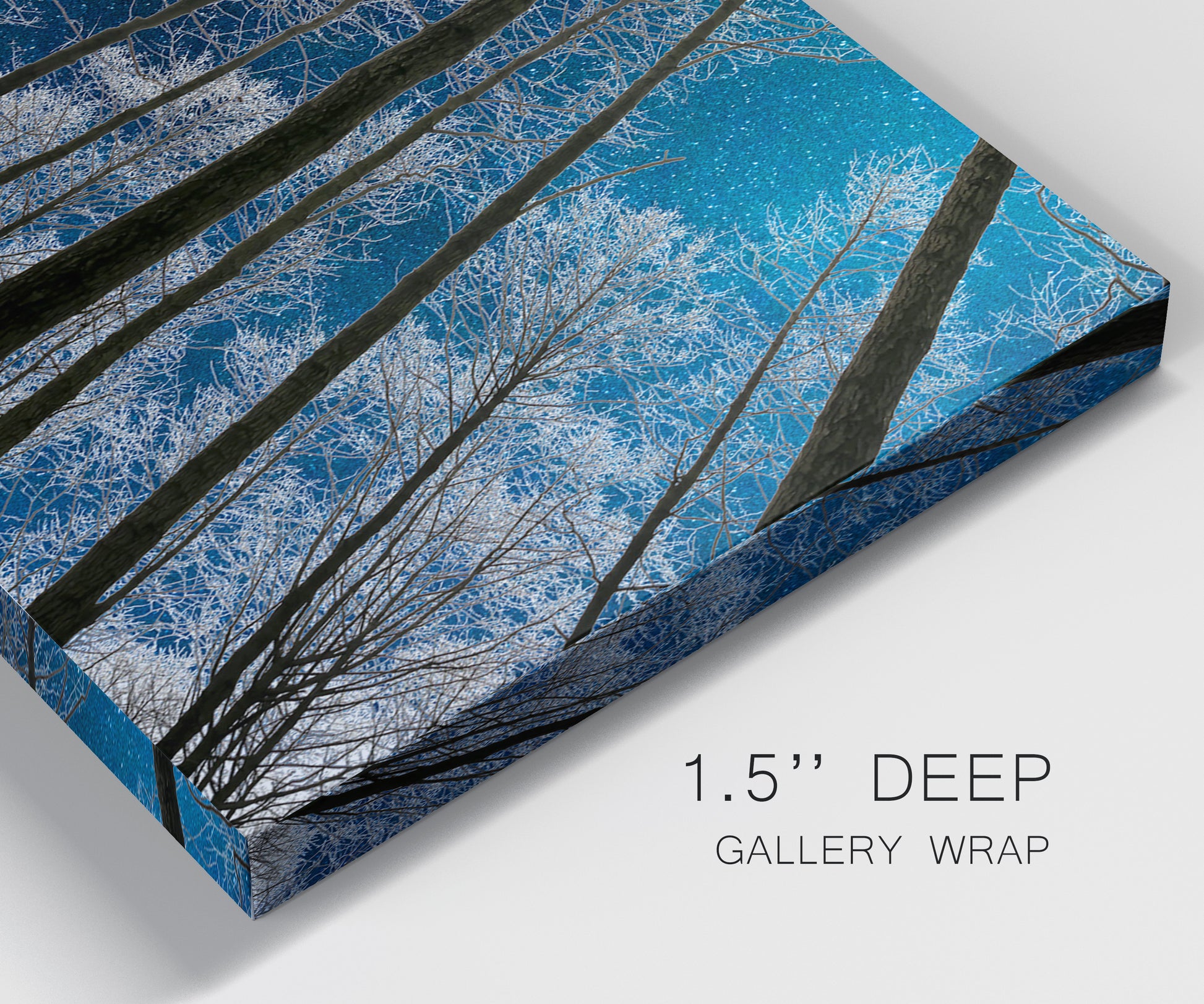 Close-up view of wrapped canvas corner featuring night landscape silhouette photography.
