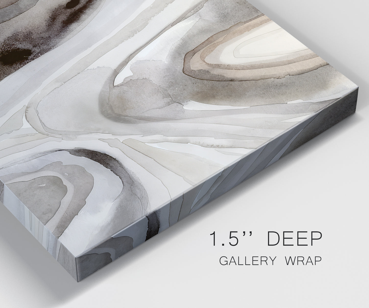 Close-up view of wrapped canvas corner featuring layered stone inspired abstract forms.