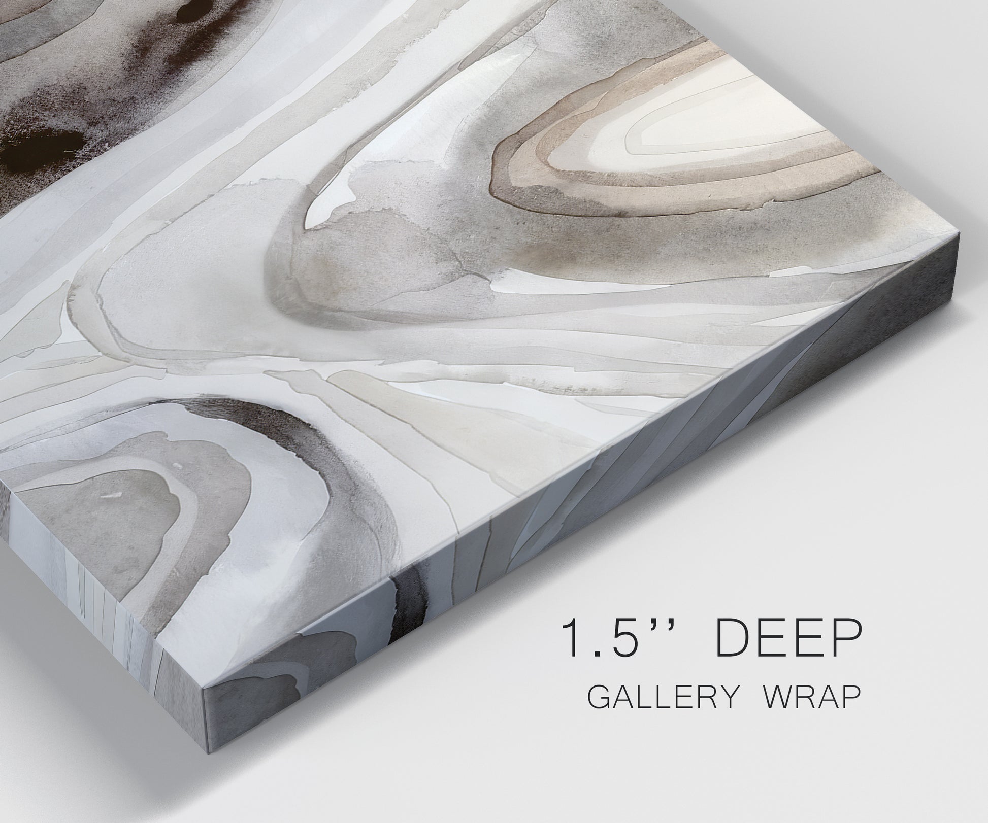 Close-up view of wrapped canvas corner featuring layered stone inspired abstract forms.