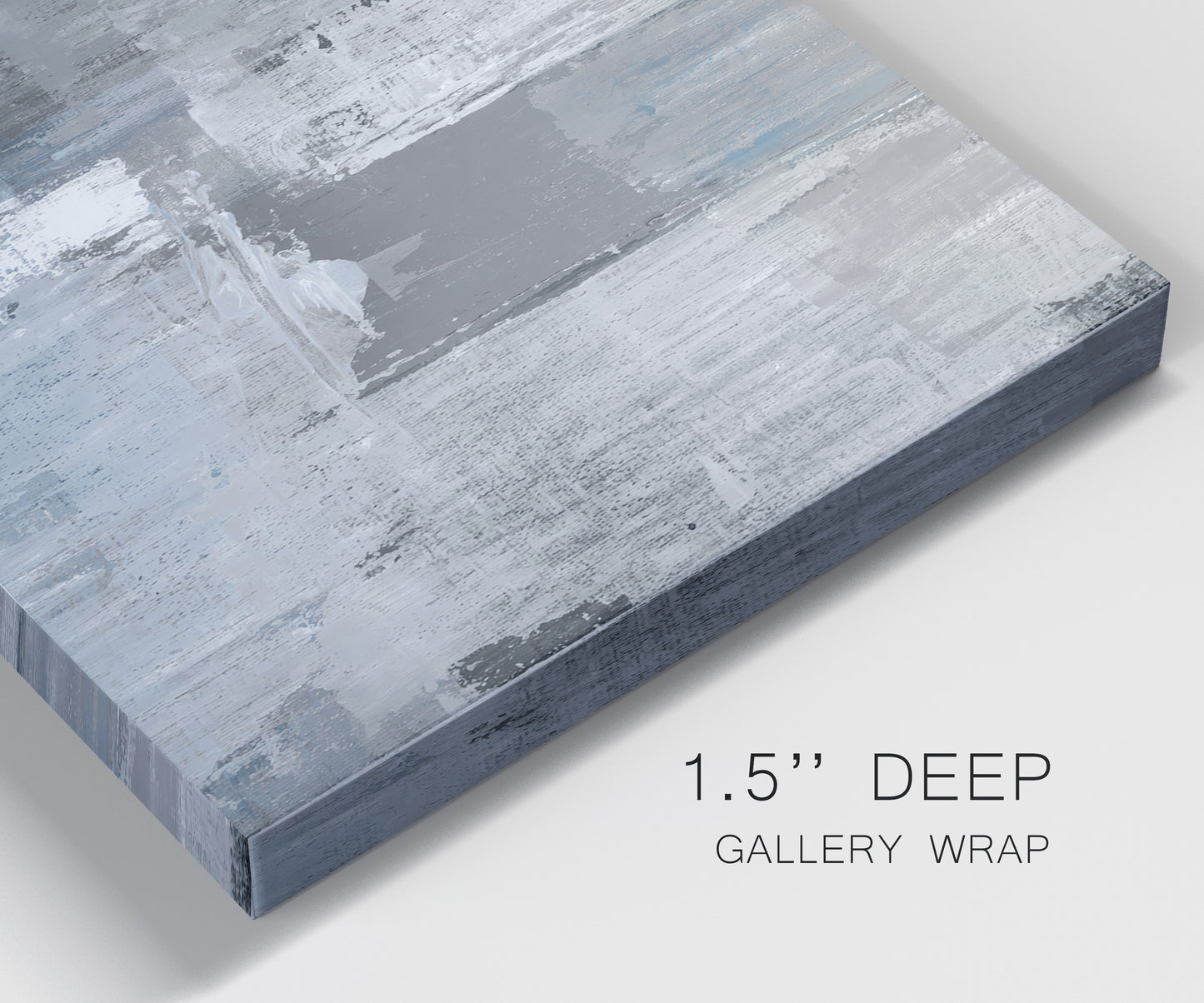Close-up view of wrapped canvas corner featuring cool toned industrial abstract blues.
