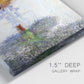 Close-up view of wrapped canvas corner featuring golden autumn light over riverside.