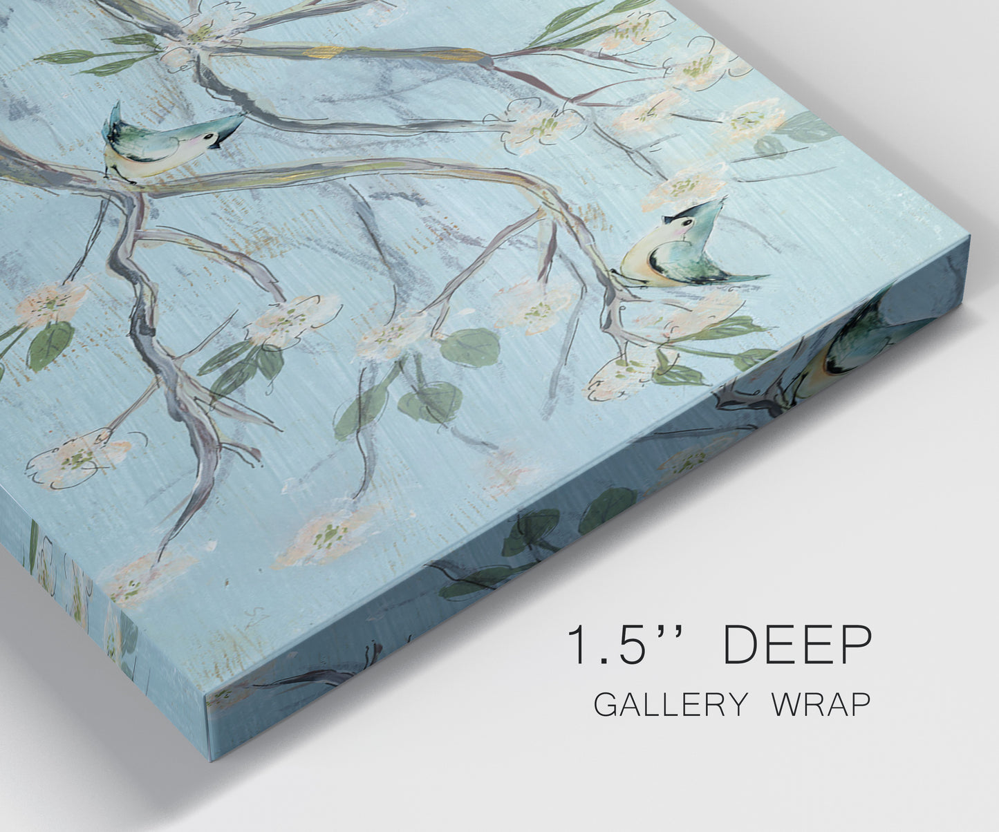Close-up view of wrapped canvas corner featuring blue sky with flowering branches.