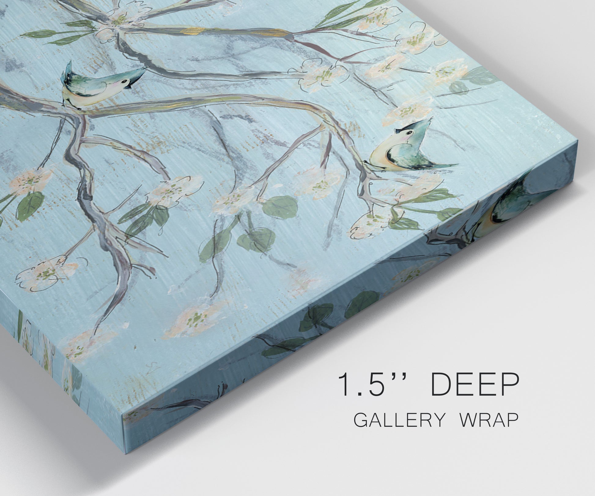 Close-up view of wrapped canvas corner featuring blue sky with flowering branches.