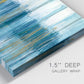 Close-up view of wrapped canvas corner featuring layered abstract earth tones.