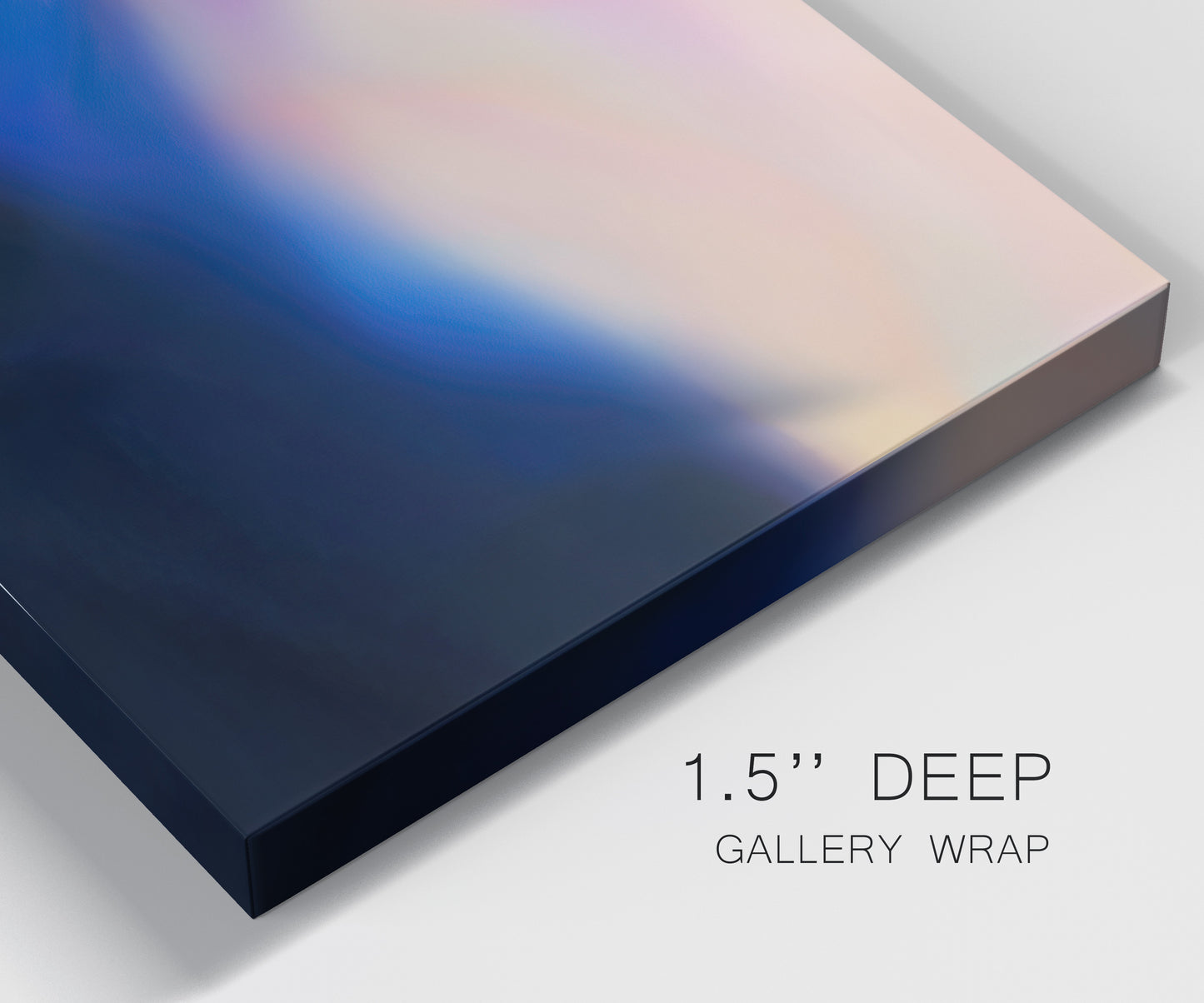 Close-up view of wrapped canvas corner featuring smooth abstract sunset color gradient.