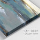 Close-up view of wrapped canvas corner featuring rocky coastal bluff above sea.