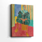 Side view of a canvas art print of a stylized portrait with decorative patterns and strong color, showing gallery-wrapped depth.