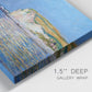 Close-up view of wrapped canvas corner featuring white cliffs rising above sea.