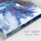 Close-up view of wrapped canvas corner featuring vibrant abstract color explosion.