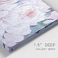 Close-up view of wrapped canvas corner featuring soft pink peonies in bloom.