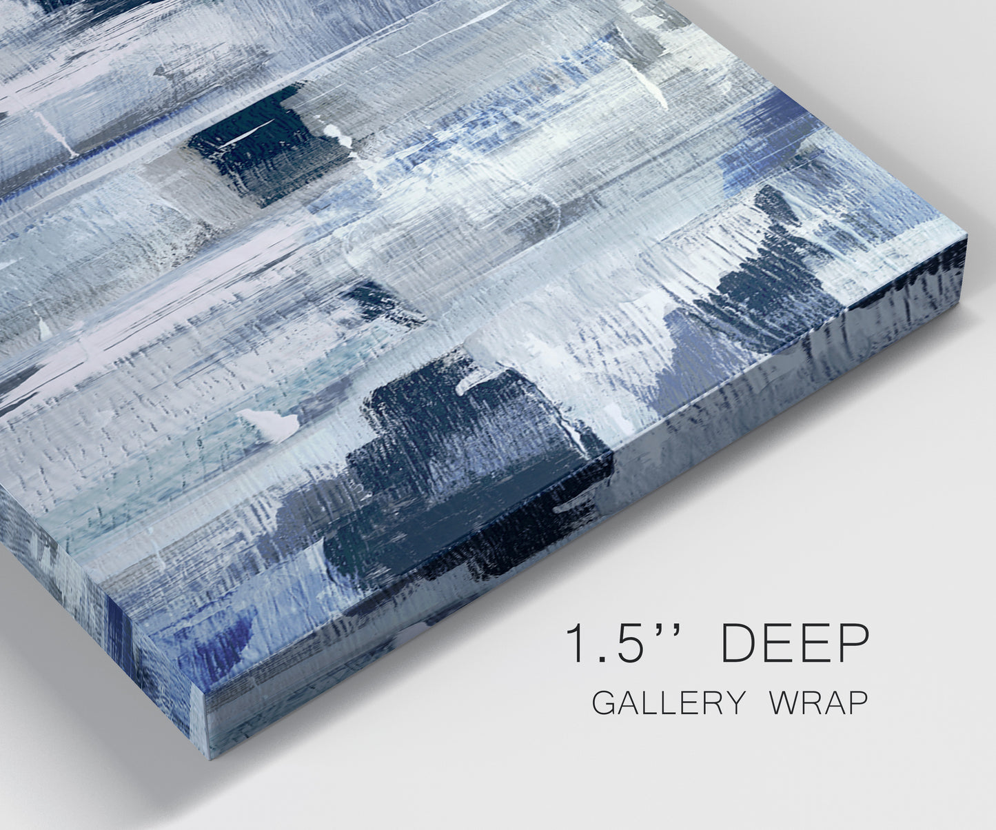 Close-up view of wrapped canvas corner featuring soft abstract mountain color fields.