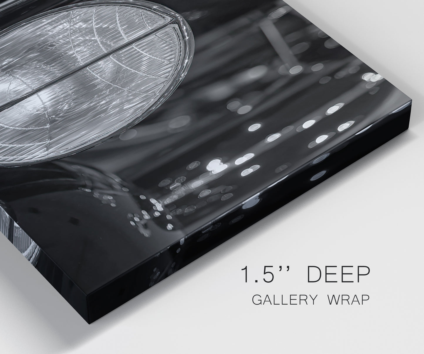 Close-up view of wrapped canvas corner featuring vintage car grille detail.