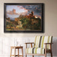 Romantic allegorical landscape painting by Jasper Francis Cropsey in an ornate black frame with gilded inner detail displayed in a light-toned interior setting.
