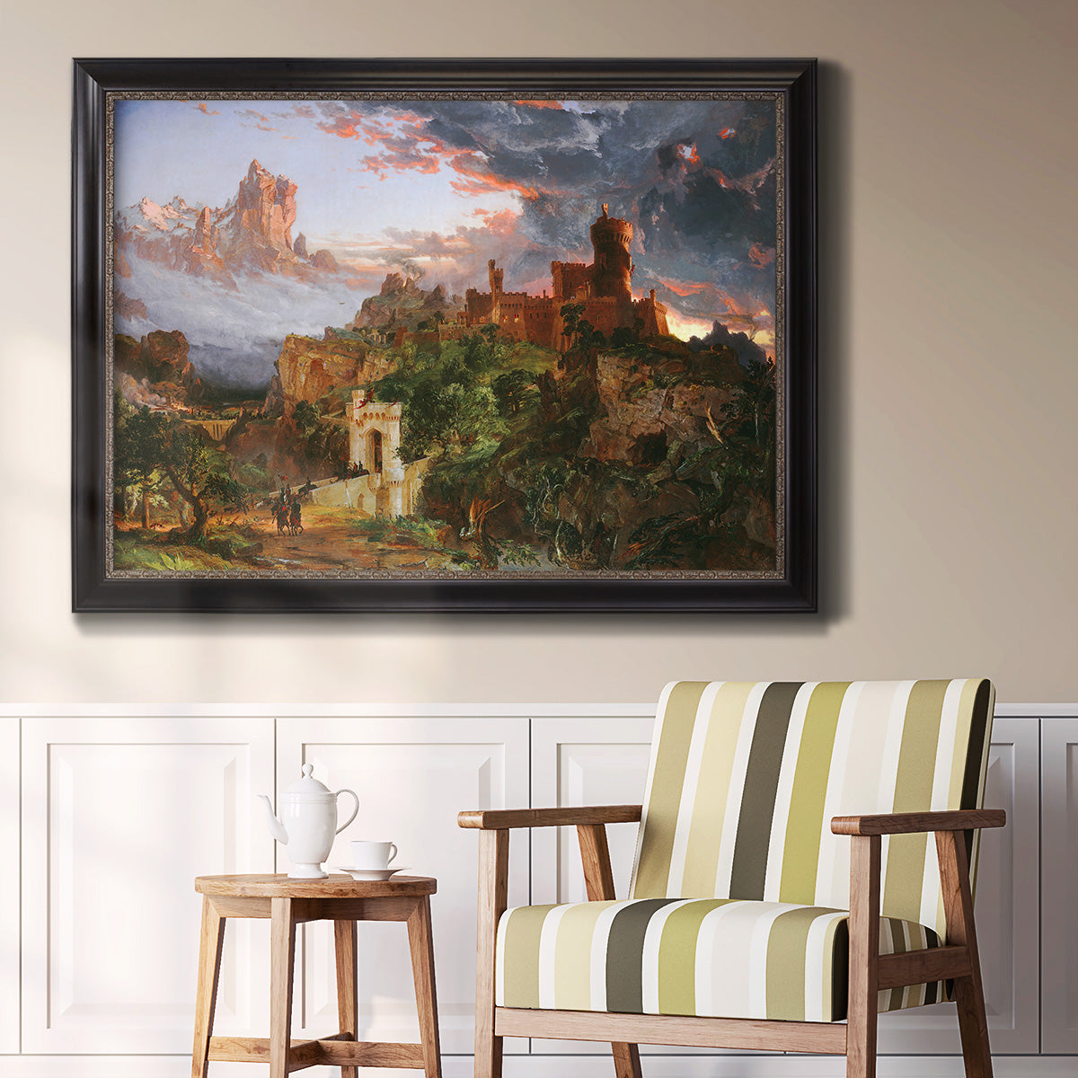 Romantic allegorical landscape painting by Jasper Francis Cropsey in an ornate black frame with gilded inner detail displayed in a light-toned interior setting.