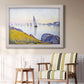 Impressionist coastal harbor at dusk by Paul Signac in an ornate weathered white frame displayed in a light-toned interior setting.