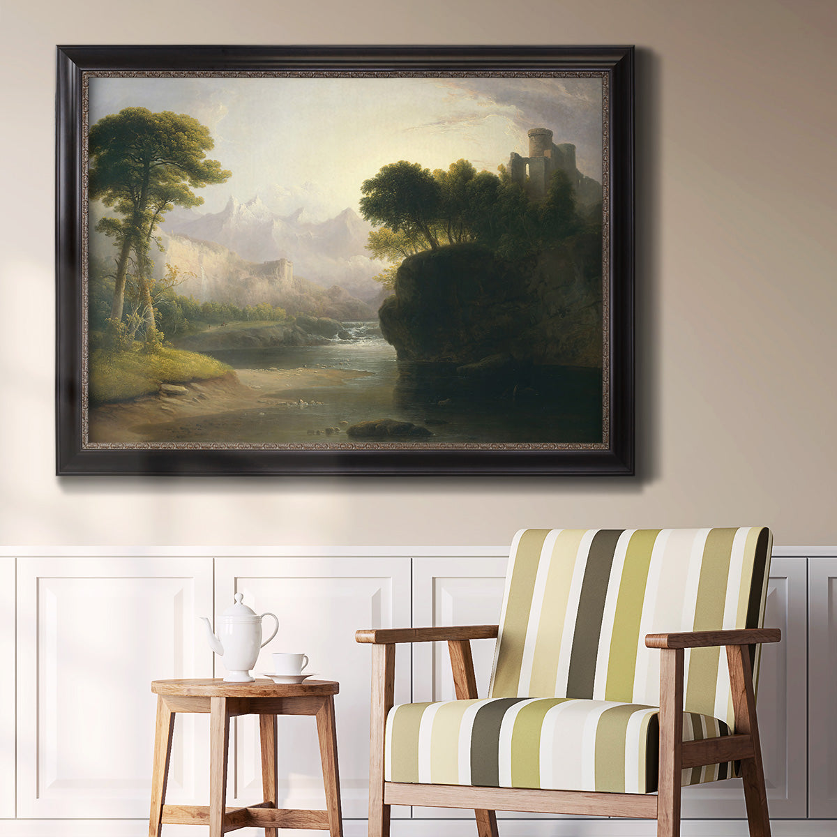 Romantic autumn landscape along the Hudson River by Thomas Doughty in an ornate black frame with gilded inner detail displayed in a light-toned interior setting.