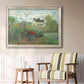 Impressionist garden landscape at Argenteuil by Claude Monet in an ornate champagne frame displayed in a light-toned interior setting.