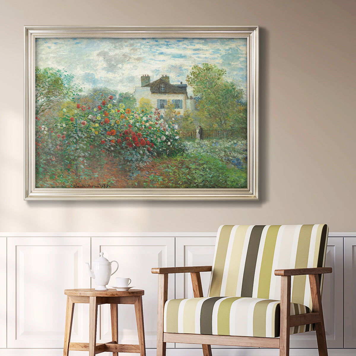 Impressionist garden landscape at Argenteuil by Claude Monet in an ornate champagne frame displayed in a light-toned interior setting.