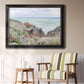 Impressionist coastal watch cabin scene by Claude Monet in an ornate black frame with gilded inner detail displayed in a light-toned interior setting.