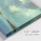 Close-up view of wrapped canvas corner featuring still lagoon water beneath open sky.