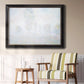 Impressionist atmospheric landscape in morning haze by Claude Monet in an ornate black frame with gilded inner detail displayed in a light-toned interior setting.