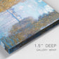 Close-up view of wrapped canvas corner featuring autumn landscape with glowing foliage.
