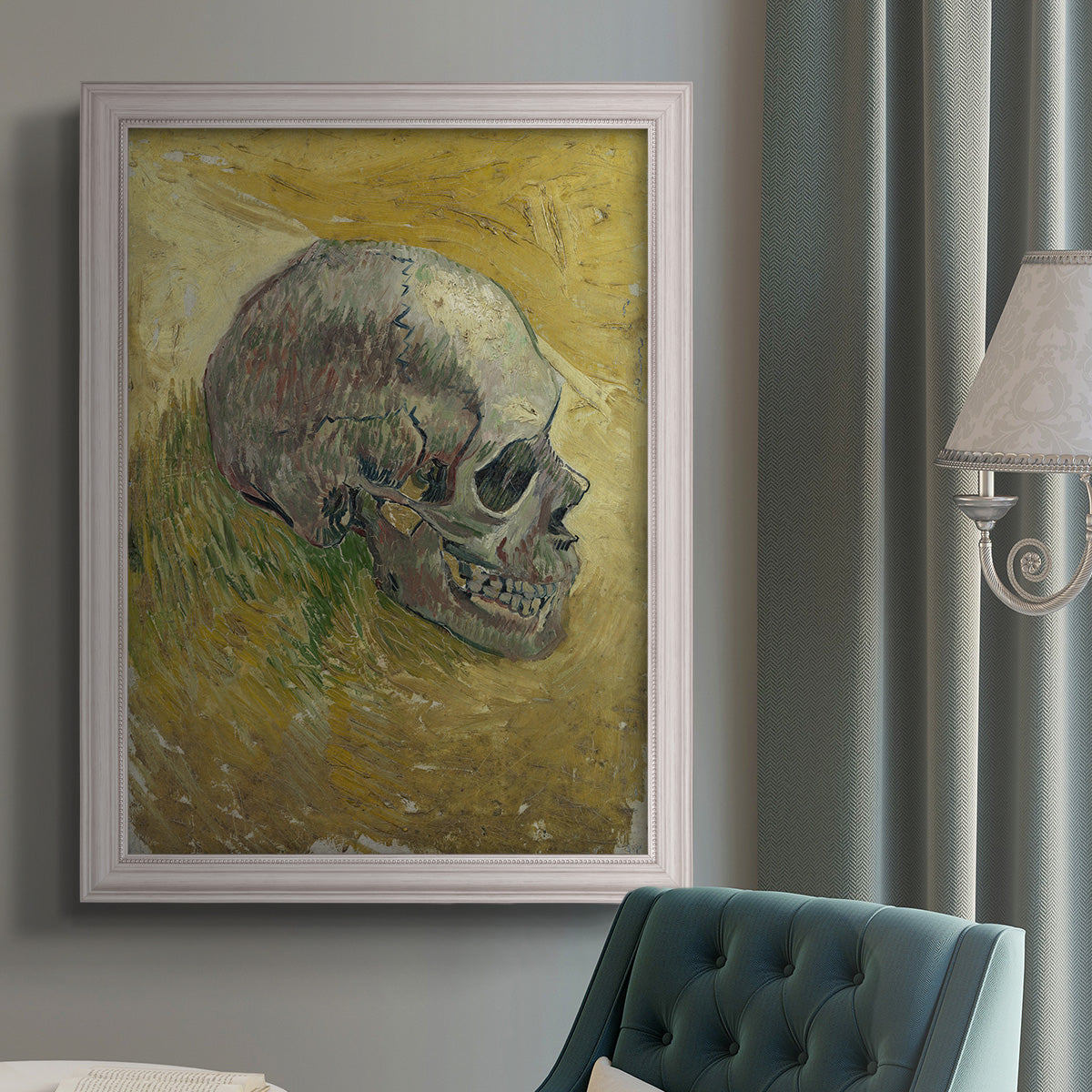 Profile skull study artwork by Vincent van Gogh in an {frame_style_descriptor} displayed in a neutral interior setting.