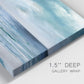 Close-up view of wrapped canvas corner featuring calm coastal shoreline.