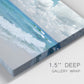 Close-up view of wrapped canvas corner featuring tropical beach scene with turquoise water.