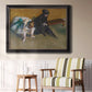 Impressionist portrait of a seated woman by Edgar Degas in an ornate black frame with gilded inner detail displayed in a light-toned interior setting.