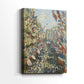 Side view of a canvas art print of a lively urban scene with banners and people, showing gallery-wrapped depth.