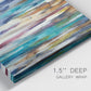 Close-up view of wrapped canvas corner featuring abstract shifting color forms.