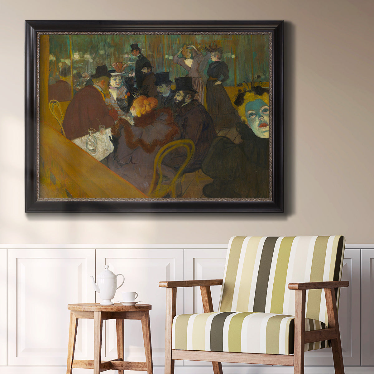Impressionist cabaret interior scene by Henri de Toulouse-Lautrec in an ornate black frame with gilded inner detail displayed in a light-toned interior setting.