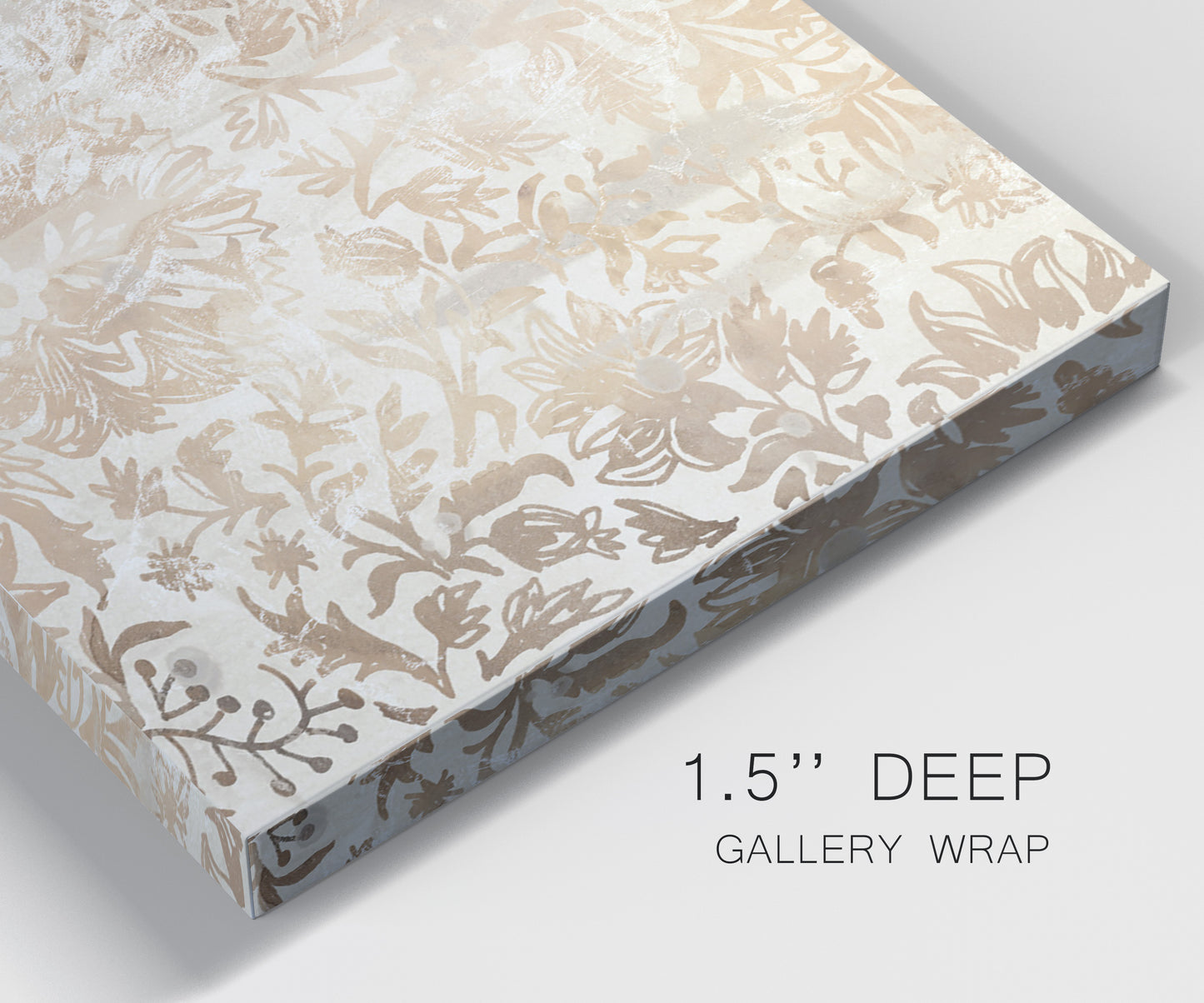 Close-up view of wrapped canvas corner featuring ornamental damask abstract pattern.