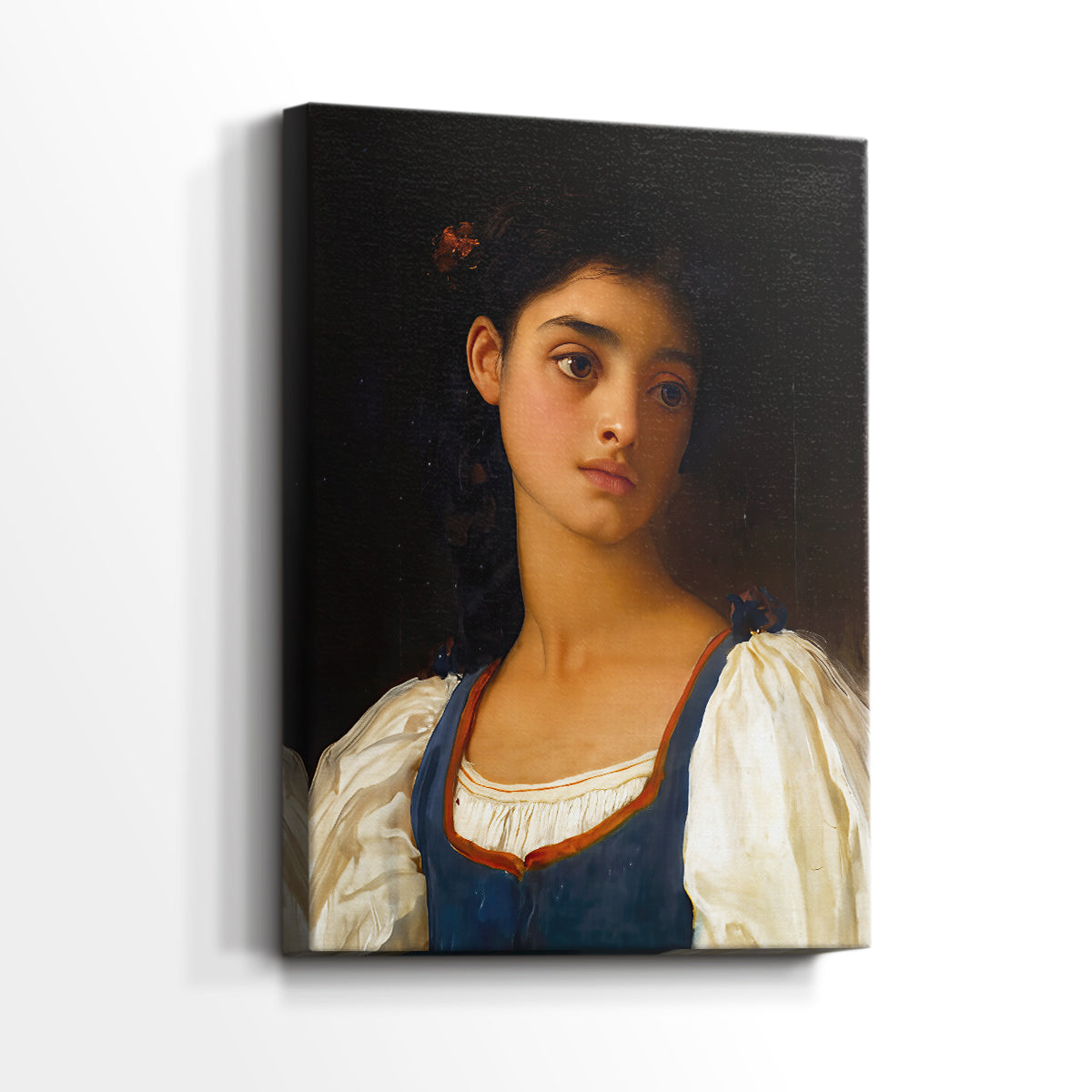Side view of a canvas art print of a refined portrait with subtle tones and gentle gaze, showing gallery-wrapped depth.