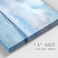 Close-up view of wrapped canvas corner featuring tropical clouds over ocean horizon.