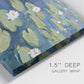 Close-up view of wrapped canvas corner featuring water lilies floating on pond.