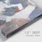 Close-up view of wrapped canvas corner featuring cool blue abstract layered composition.