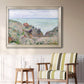 Impressionist coastal watch cabin scene by Claude Monet in an ornate champagne frame displayed in a light-toned interior setting.