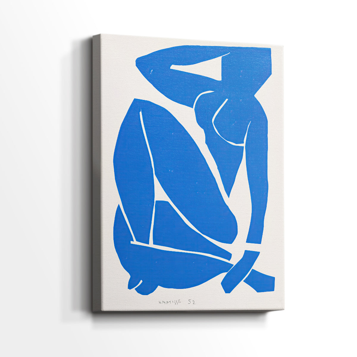 Side view of a canvas art print of a modern figure built from geometric cut-out shapes, showing gallery-wrapped depth.