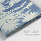 Close-up view of wrapped canvas corner featuring delicate lupine floral composition.