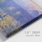 Close-up view of wrapped canvas corner featuring overcast bridge above river.
