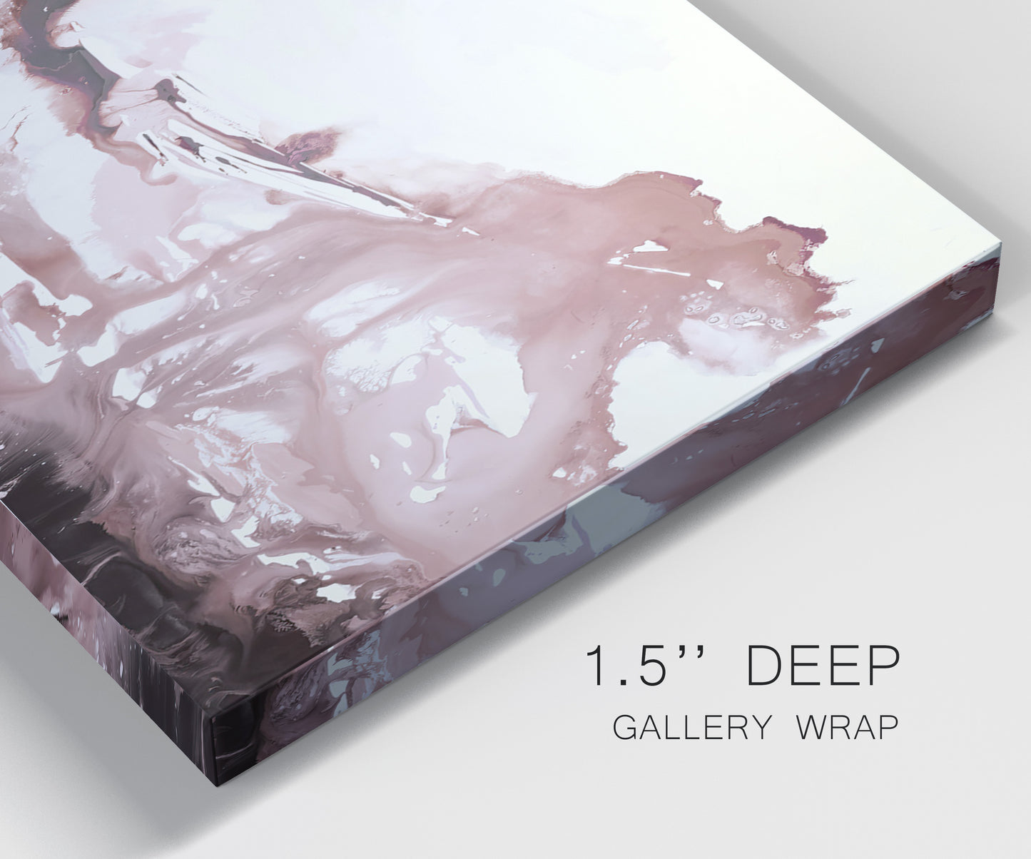 Close-up view of wrapped canvas corner featuring soft pink abstract scenic layers.