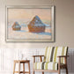 Impressionist winter haystack scene by Claude Monet in an ornate champagne frame displayed in a light-toned interior setting.