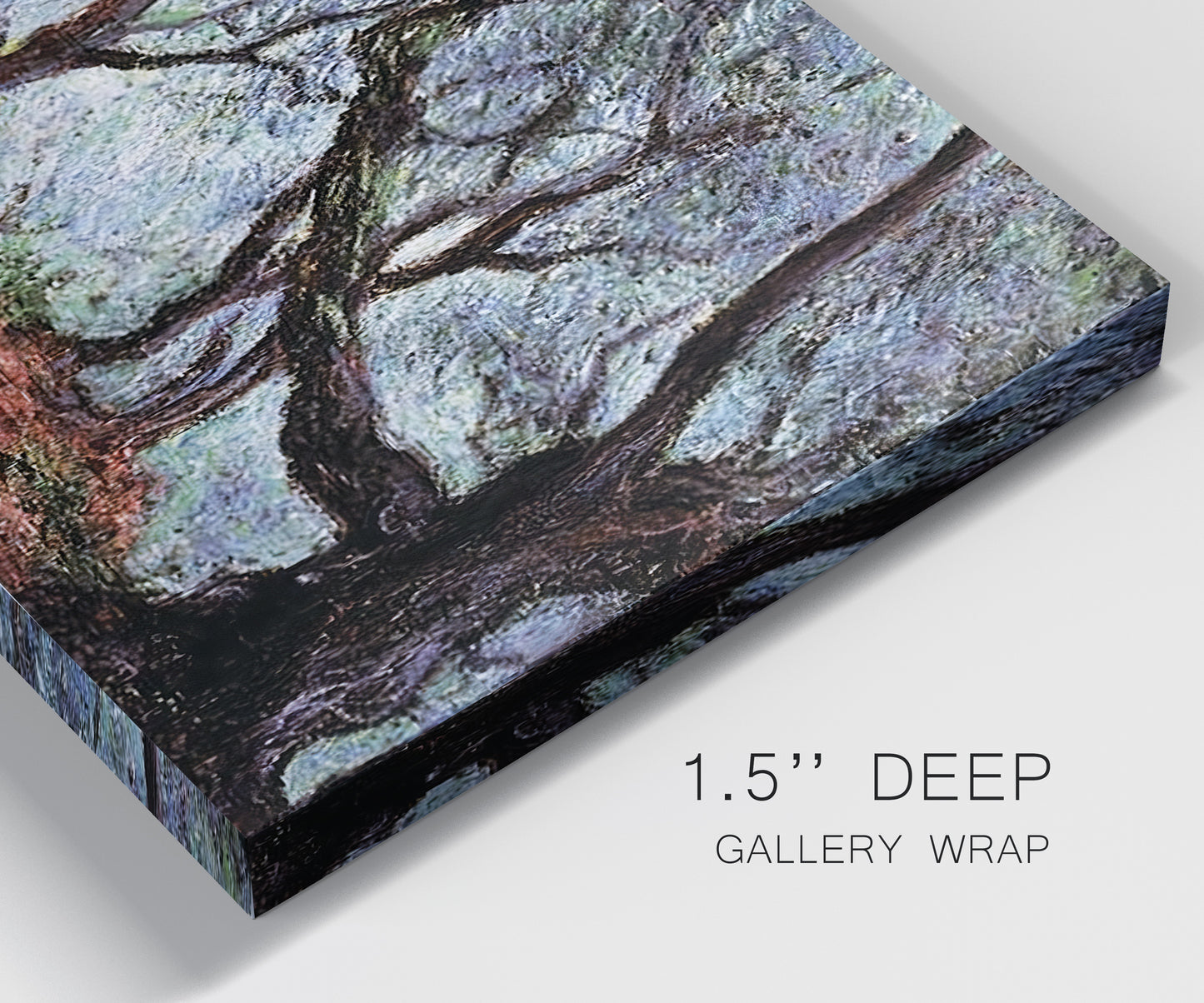 Close-up view of wrapped canvas corner featuring pine trees silhouetted at evening.
